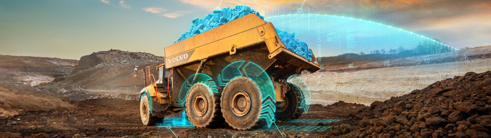 A mining dump truck is shown traveling over mounds of dirt. Blue movement lines are shown on the tires and in the dump bed.